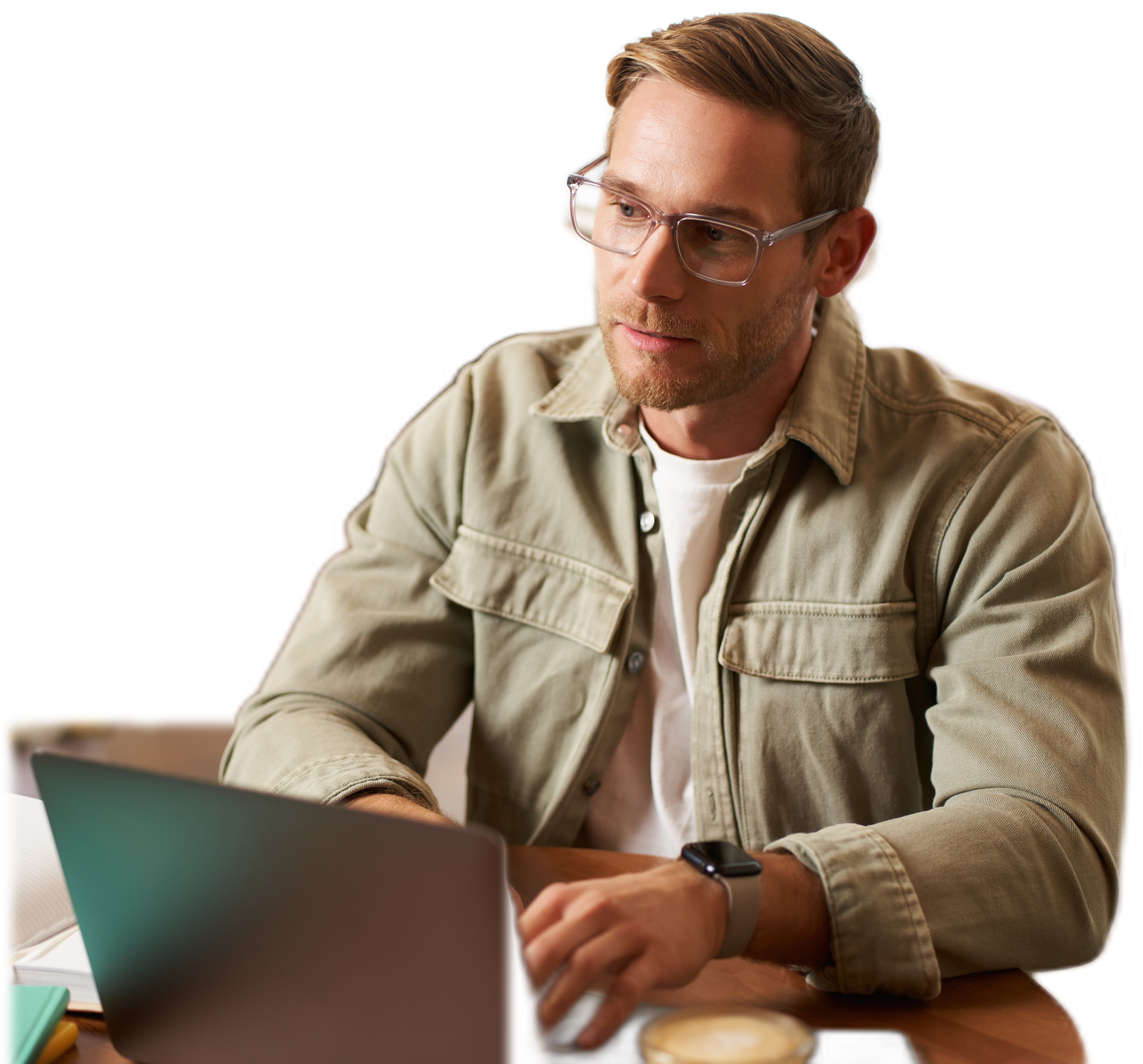 Brand founder working on a laptop in a café